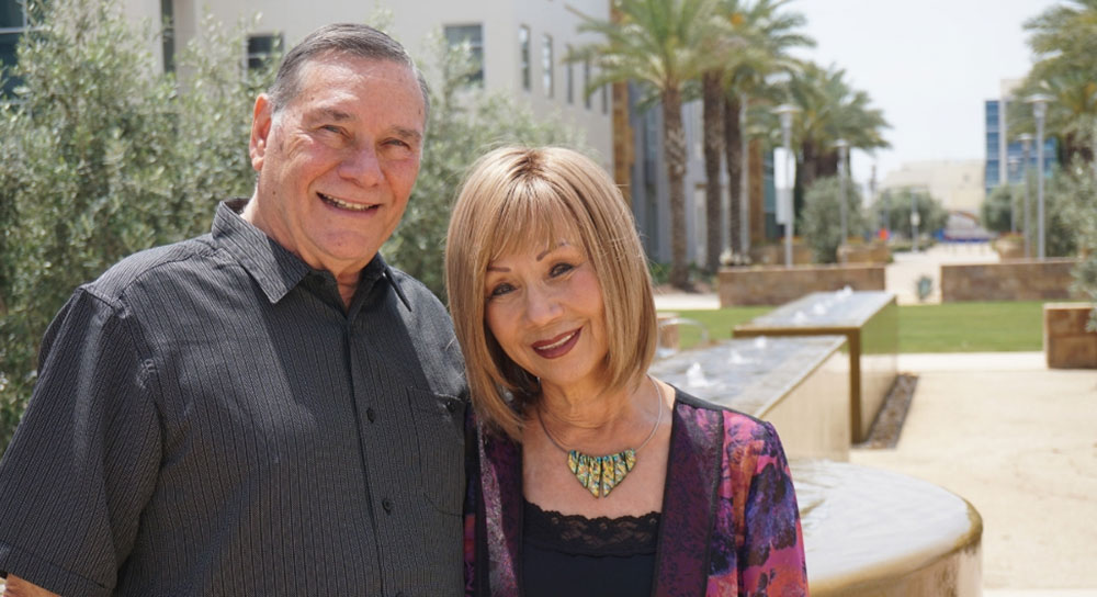 Carl and Lulu Mitchell stand in the reflection garden at Community Cancer Institute