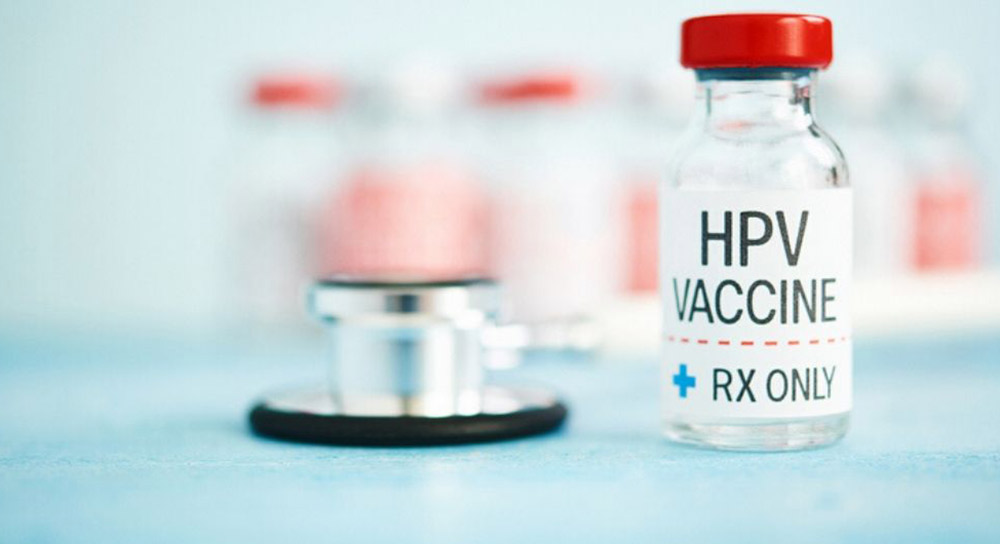 Vial reading "HPV vaccine" is shown