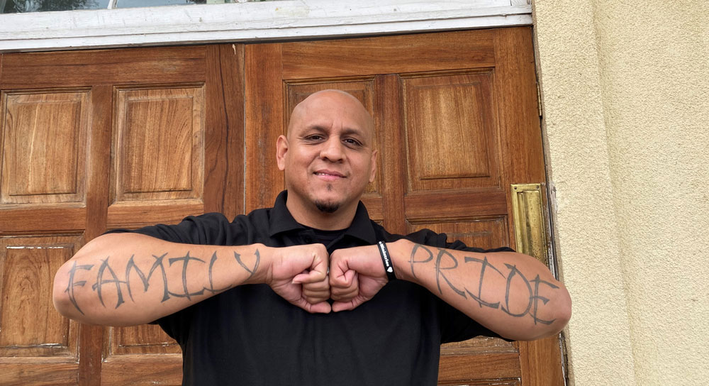Armando Alvarez II proudly shows his "Family Pride" tattoos