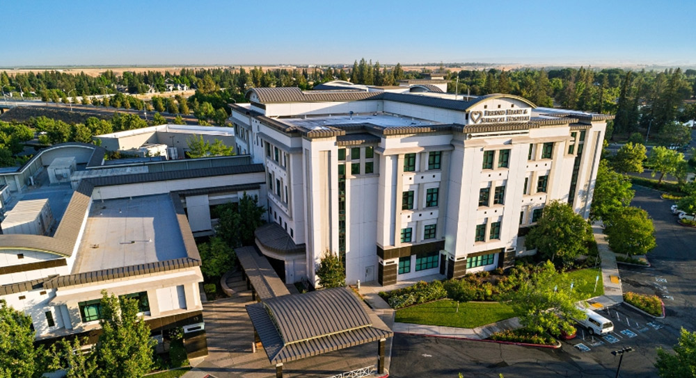 An exterior drone shot of Fresno Heart & Surgical hospital 
