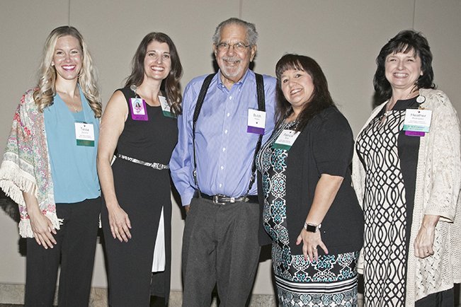 Butch Peters poses with four of the five nurse leaders who received the Alice A. Peters Nursing Leadership scholarships.