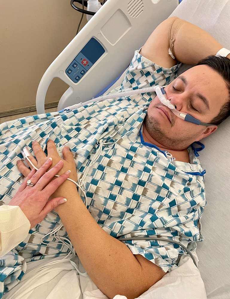 Shane Harrell hooked up to tubes in the hospital