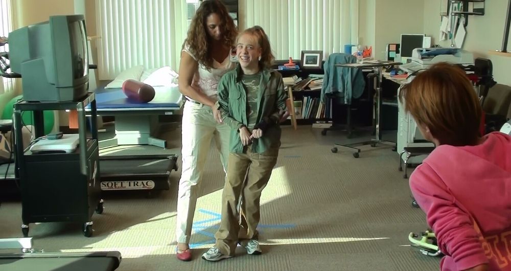 Gait-training device helps adult woman take first solo steps