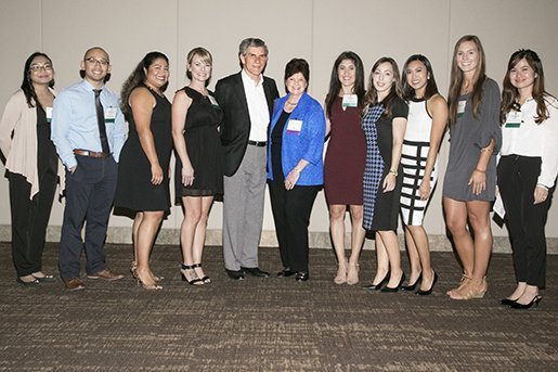 Donors Gerald and Nanette Lyles (very center) congratulate this year’s recipients of their scholarship.