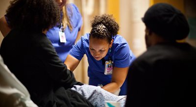 Candy Zaranyika cares for a pregnant patient